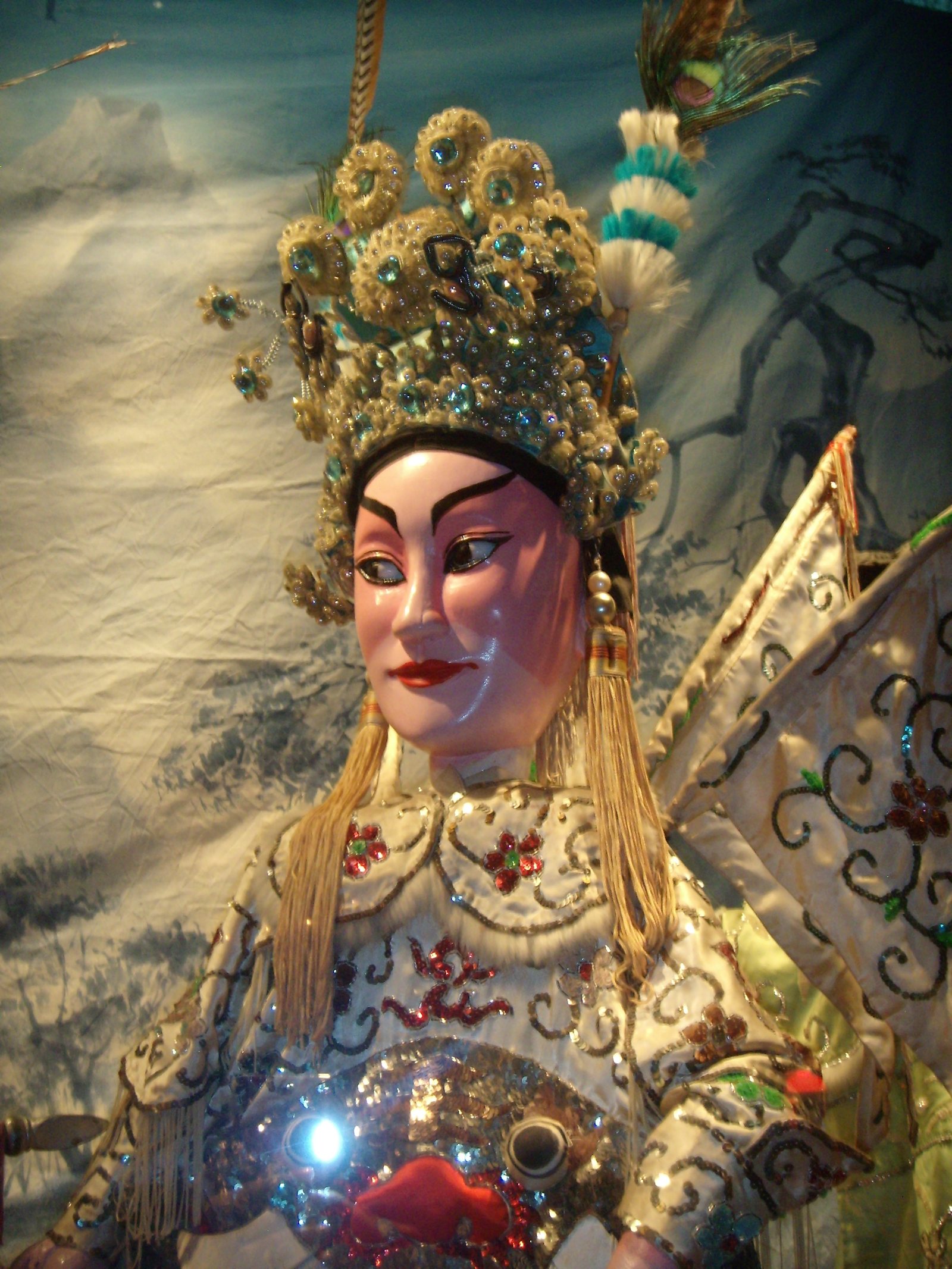 DSCN3225 Scene from a puppet show depicting General Di Qing scoring repeated victories over the Barbarians. In the depicted scene, the general is fin
