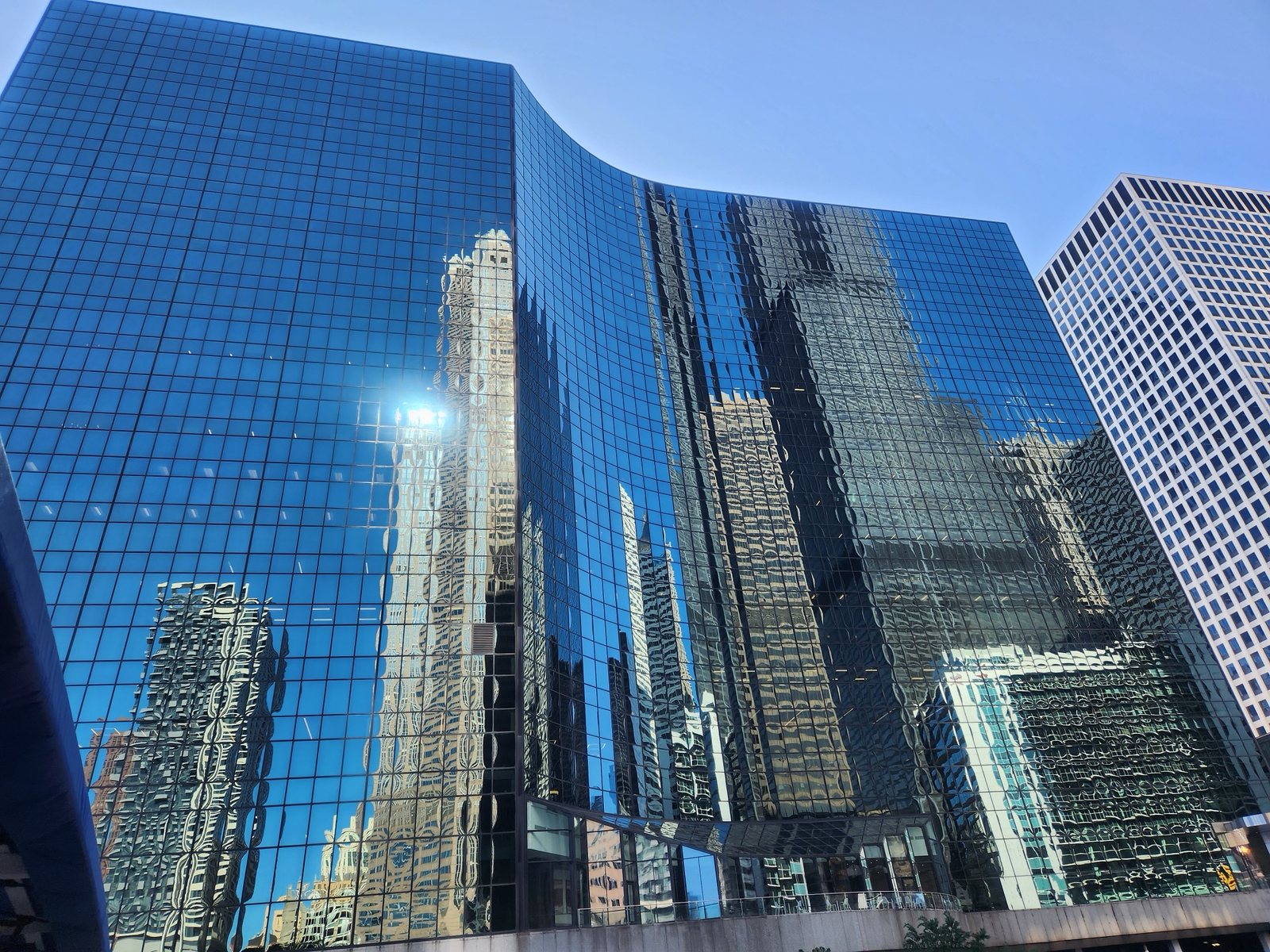 Building with mirrors reflecting other buildings